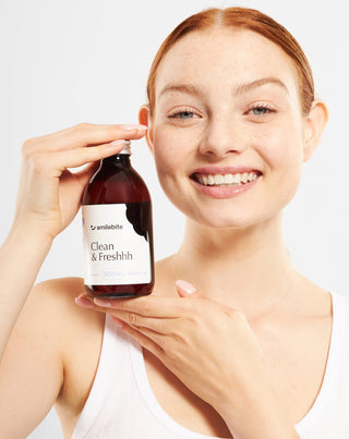 Solutie de apa de gura cu aroma de menta cu actiune anticoroziva Smilebite